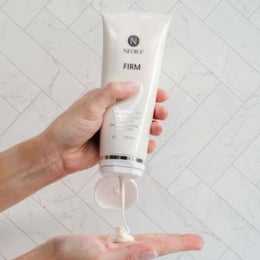 Image of a bottle of Firm Body Contour Cream with a second image of the product being dispensed into a woman’s hand.