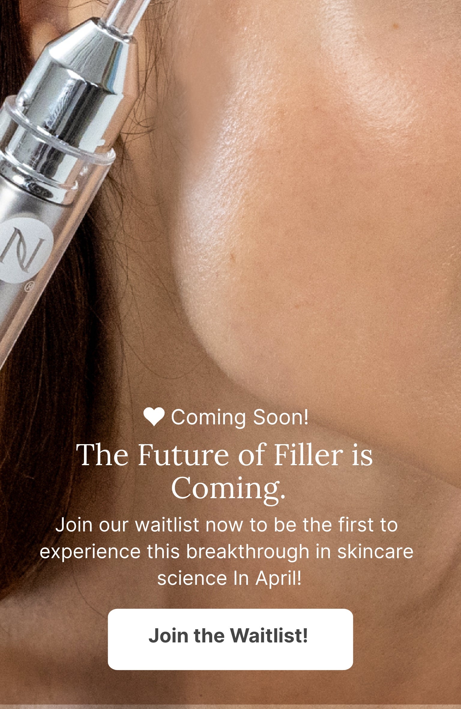 A woman holds up a Neora product to her face. Join the prelaunch team to get early access to a new product in April.