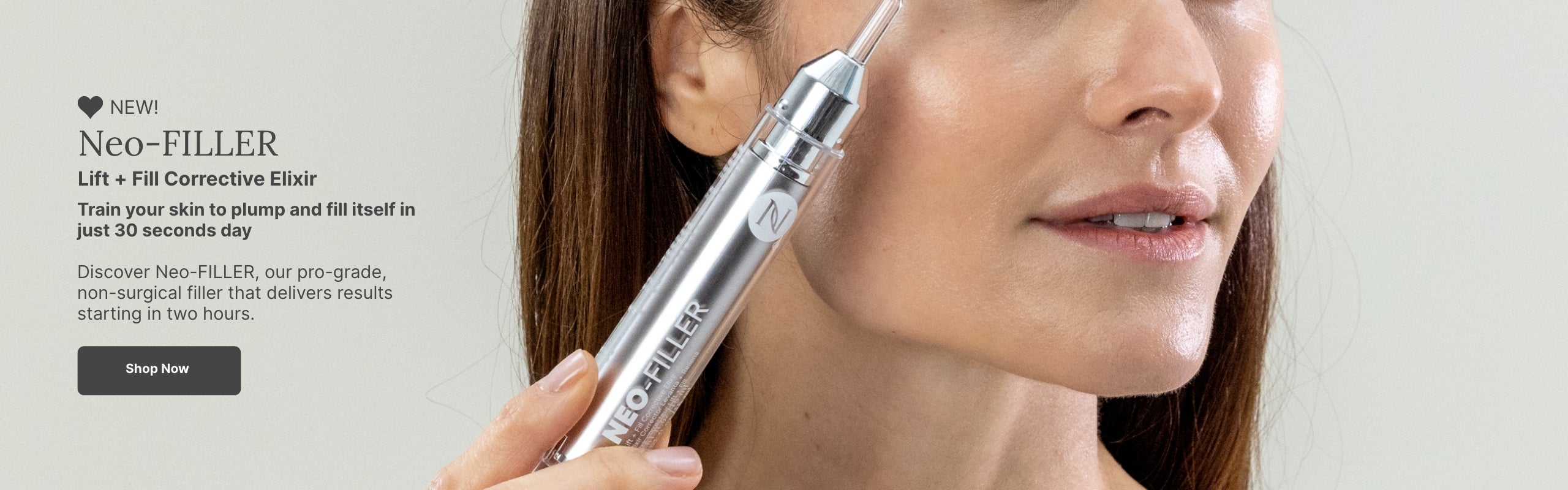 Discover Neo-Filler Lift + Corrective Elixir, our pro-grade, non-surgical filler that delivers results starting in two hours. Featured is a woman holding a Neo-Filler tube to her face.