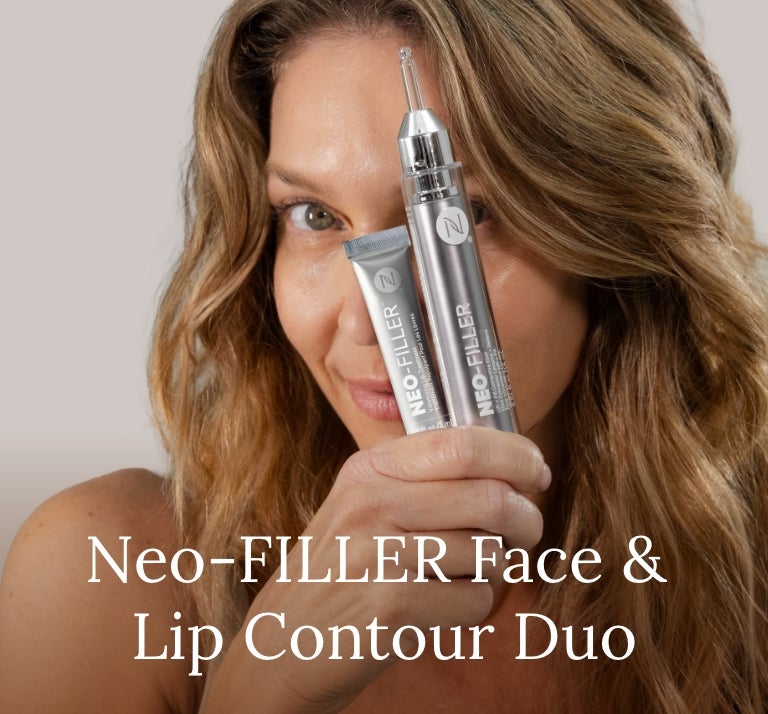 Volume, Definition & Repair—Without the Needle. Shop the Duo. Featured is a woman holding the Neo-FILLER Face & Lip Contour Duo in front of her face.