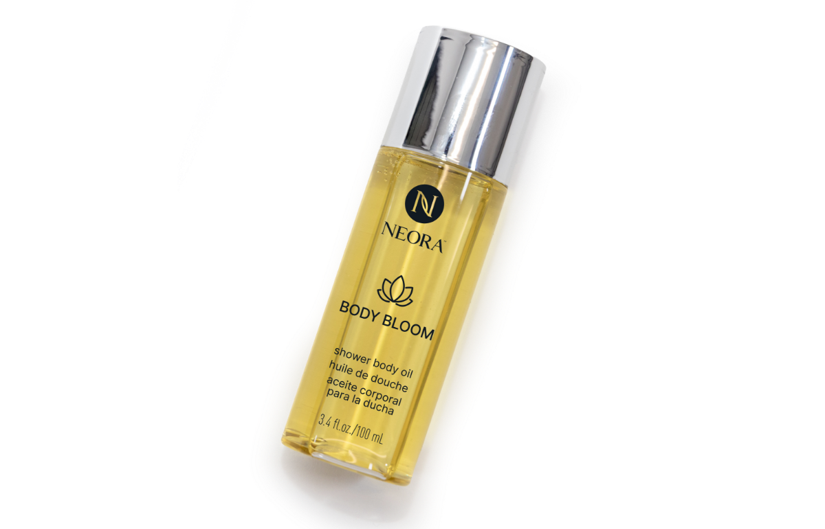 A bottle of Neora’s Body Bloom In Shower Body Oil.