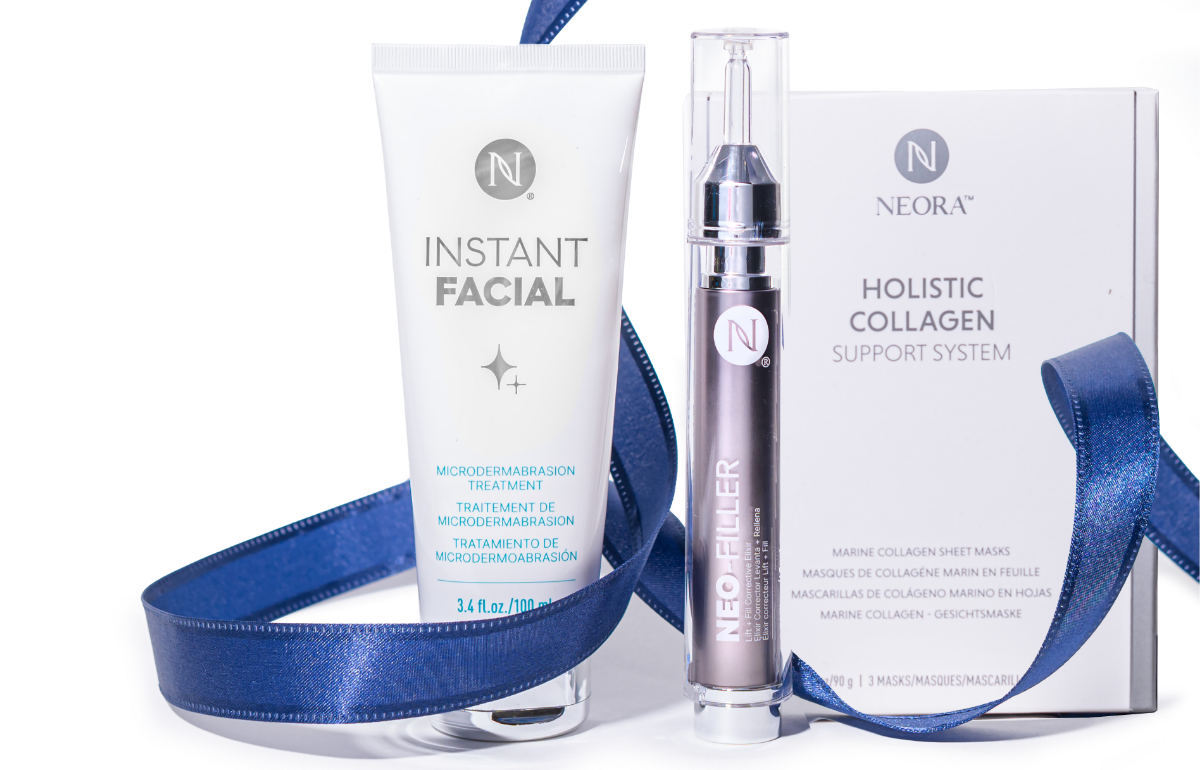 A bundle of Neora skincare products, which include Instant Facial, Neo-FILLER, and a box of Marine Collagen Sheet Masks, wrapped in blue ribbon.
