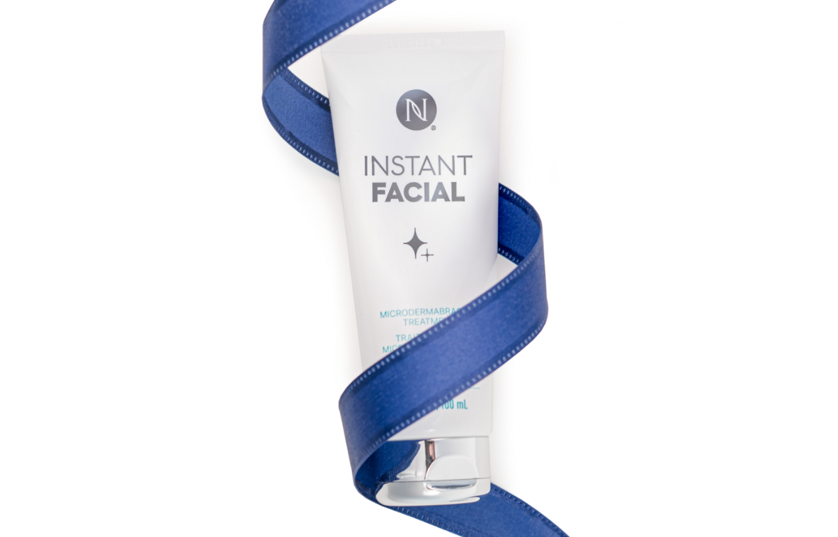 Neora’s Instant Facial tube wrapped in blue ribbon.