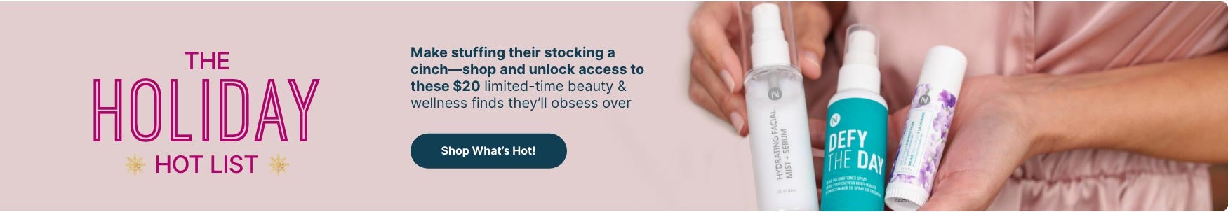 Woman holding Neora’s Holiday Hot List must-haves: Lip Plumping Serum, Hydrating Facial Mist and Zen + Calm Lavendar Balm. 