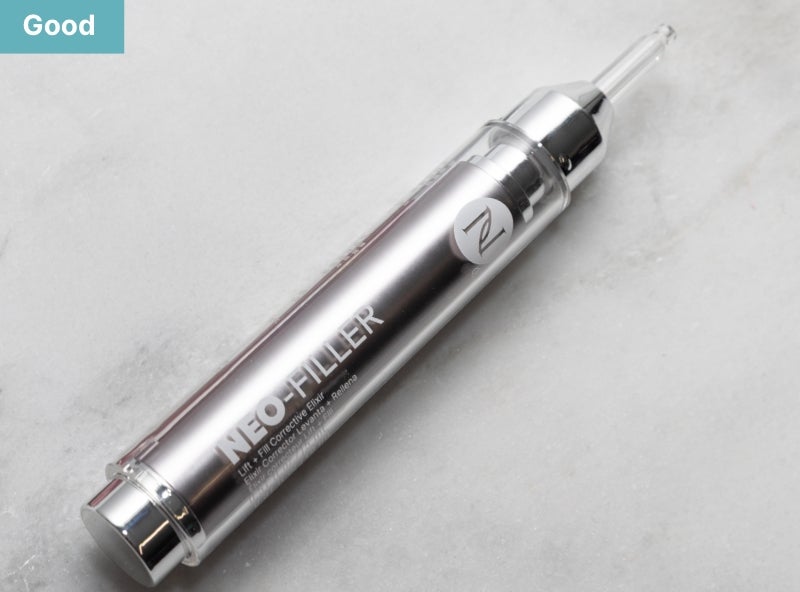 A Neo-FILLER tube on a marble background. The corner of this graphic mentions "Good."