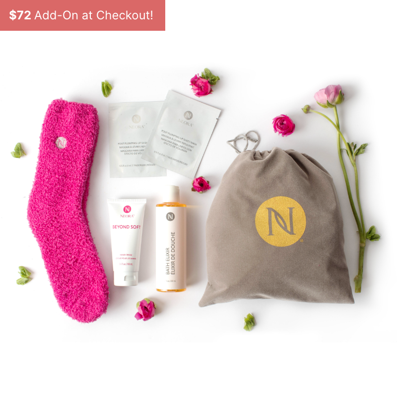 Neora Mother’s Day special Luxe Self Care gift set including fuzzy socks, lip sheet masks, hand lotion, bath elixir and a velvet drawstring gift bag in which to present it.  