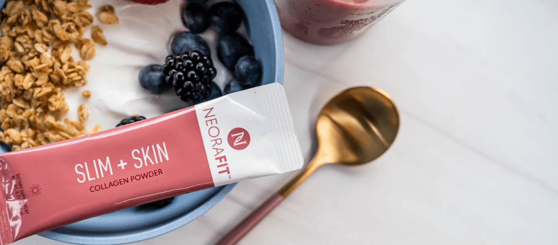 A sachet of NeoraFit Slim + Skin rested on a bowl filled with parfait.