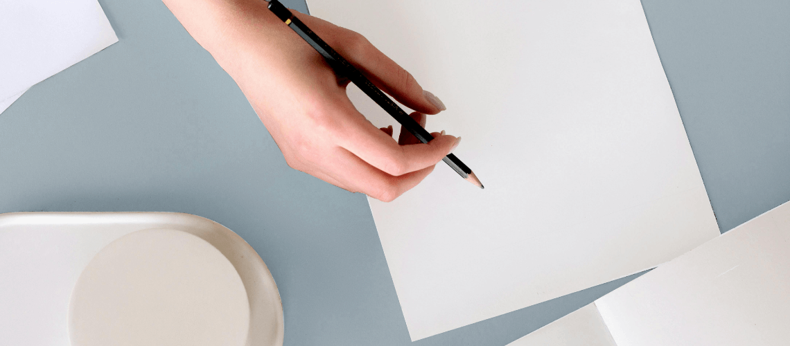 A person preparing to write something down.