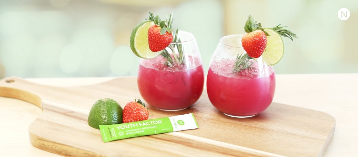 Two glasses filled with Neora Youth Factor.