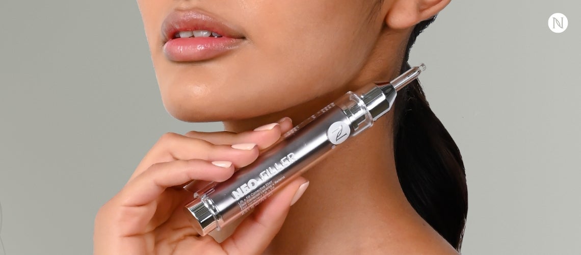 A woman holding Neo-Filler under her chin.