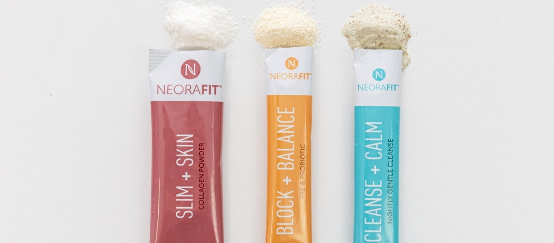 Three NeoraFit powder sachets (Slim + Skin, Block + Balance, Cleanse + Calm) with powder scoops on top, on a white surface.