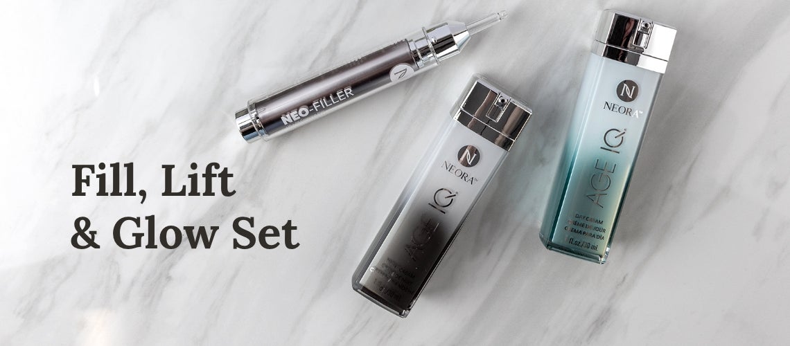Three Neora skincare bottles arranged on a white marble surface with bold text 'Fill, Lift & Glow Set' in the foreground (advertisement).