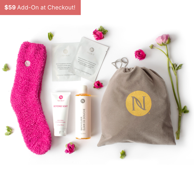 Neora Mother’s Day special Luxe Self Care gift set including fuzzy socks, lip sheet masks, hand lotion, bath elixir and a velvet drawstring gift bag in which to present it.