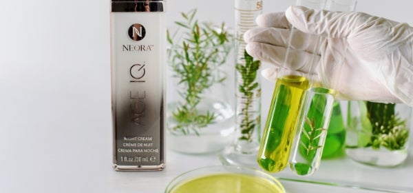 Neora products next to vials of liquid.