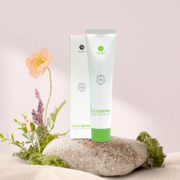 Neora Youth Factor® Superfood & Antioxidant (Powder) pictured with watermelon