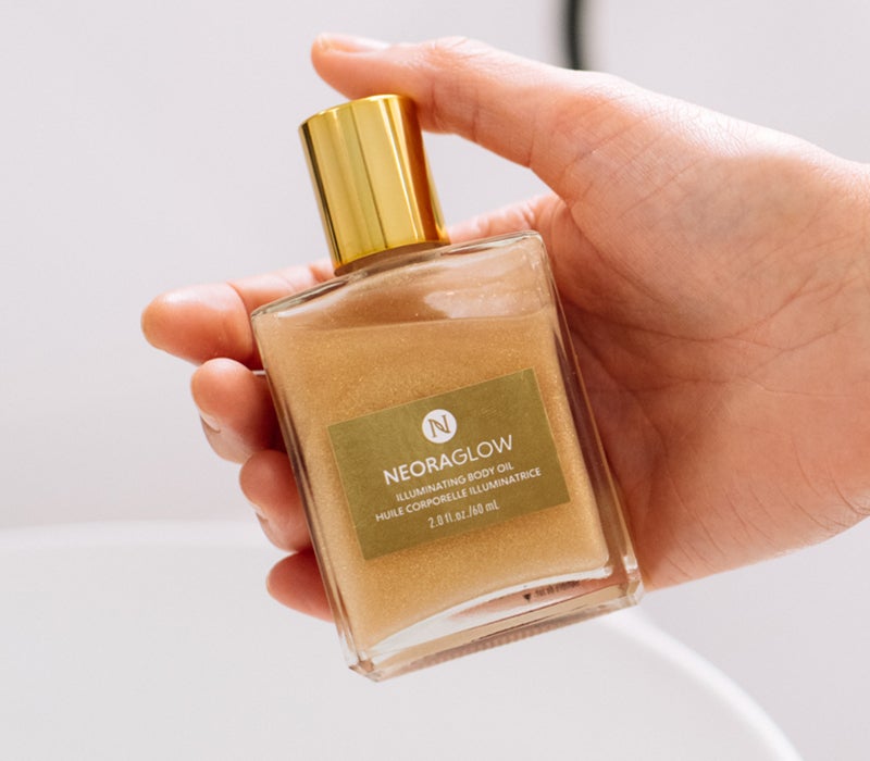 Neora’s hottest holiday limited-time must-have, Glisten Up Holiday Body Glow Oil!